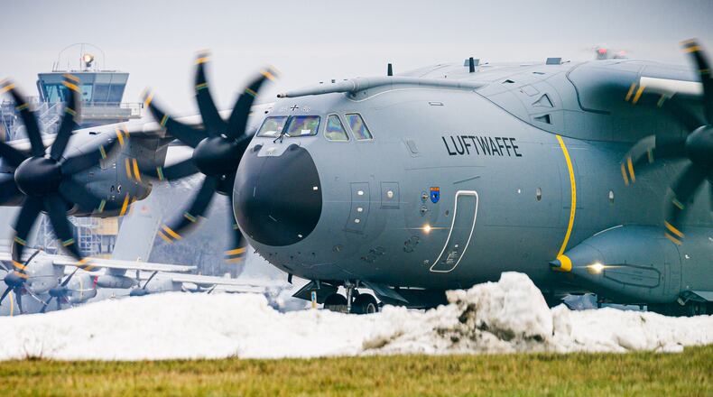 An Airbus A400M transport aircraft of the German Air Force taxis over the grounds at Wunstorf Air Base in the Hanover region, Germany, Thursday, Jan. 15, 2026 as troops from NATO countries, including France and Germany, are arriving in Greenland to boost security. (Moritz Frankenberg/dpa via AP)