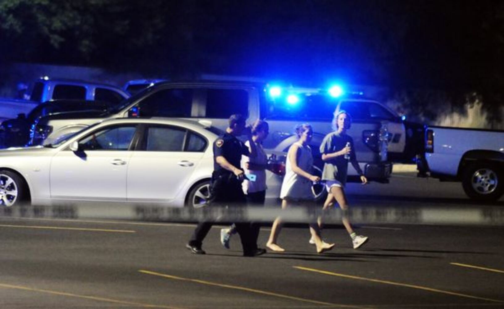 Police: 3 dead, 7 hurt in movie theater shooting