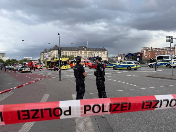 Police near the scene of a stabbing at Hamburg Central Station in Hamburg, Germany, Friday, May 23, 2025. (Steven Hutchings/dpa via AP)