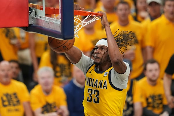 Indiana Pacers center Myles Turner dunks against the Oklahoma City Thunder during the second half of Game 6 of the NBA Finals basketball series, Thursday, June 19, 2025, in Indianapolis. (AP Photo/Michael Conroy)