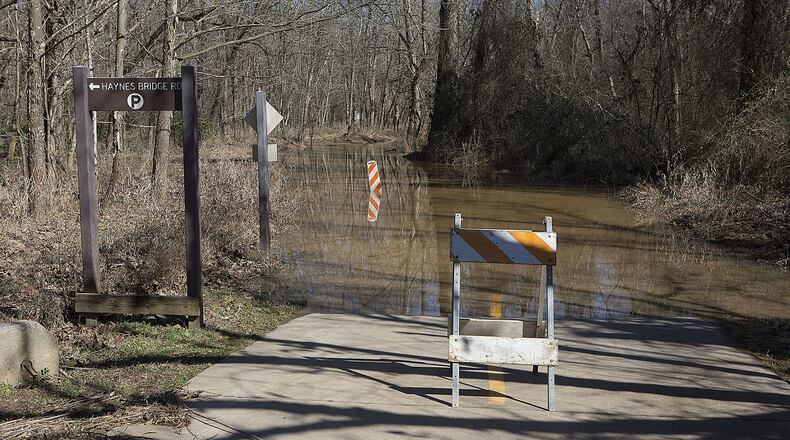 Big Creek overflowed its banks after heavy rains, shutting portions of the Big Creek Greenway. Roswell has assigned to a consultant an update of the Big Creek Watershed Improvement Plan, which will include a priorized list of future capital projects. (Photo by Phil Skinner)