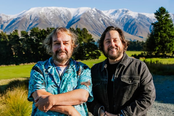 Filmmaker Peter Jackson, left, and Colossal CEO Ben Lamm poses for a photo outside Christchurch, New Zealand, in 2025. (Courtesy of Colossal Biosciences via AP)