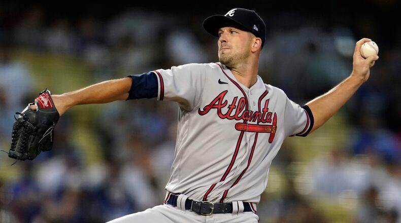 Braves starting pitcher Drew Smyly throws during the first inning of a baseball game against the Los Angeles Dodgers, Monday, Aug. 30, 2021, in Los Angeles. (AP Photo/Marcio Jose Sanchez)