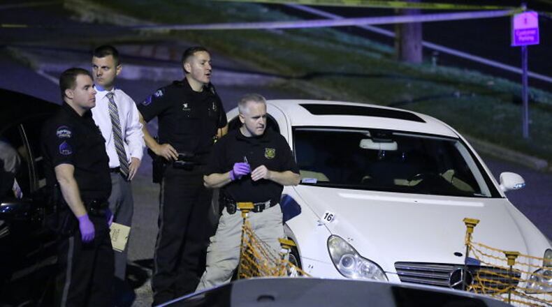 Sandy Springs police investigate the scene of a shooting outside the Taboo 2 Bistro & Bar on Roswell Road.