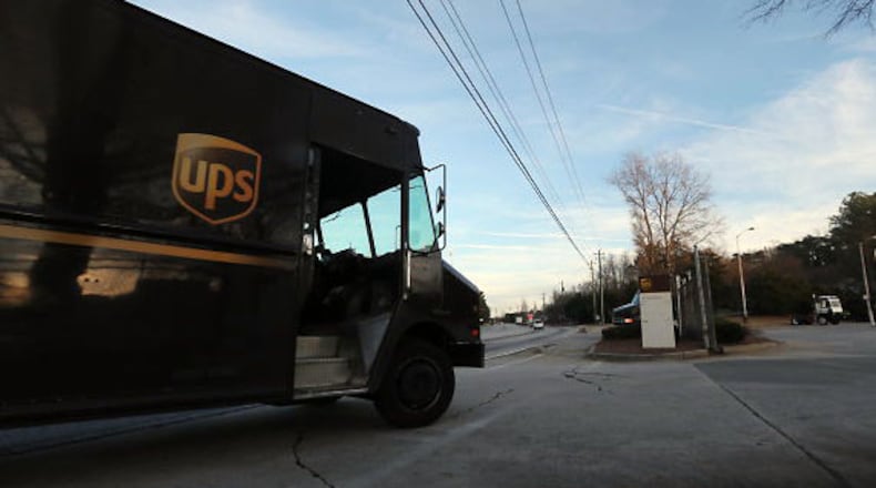 UPS delivery trucks returning to the UPS facility on Pleasantdale Rd in Doraville.