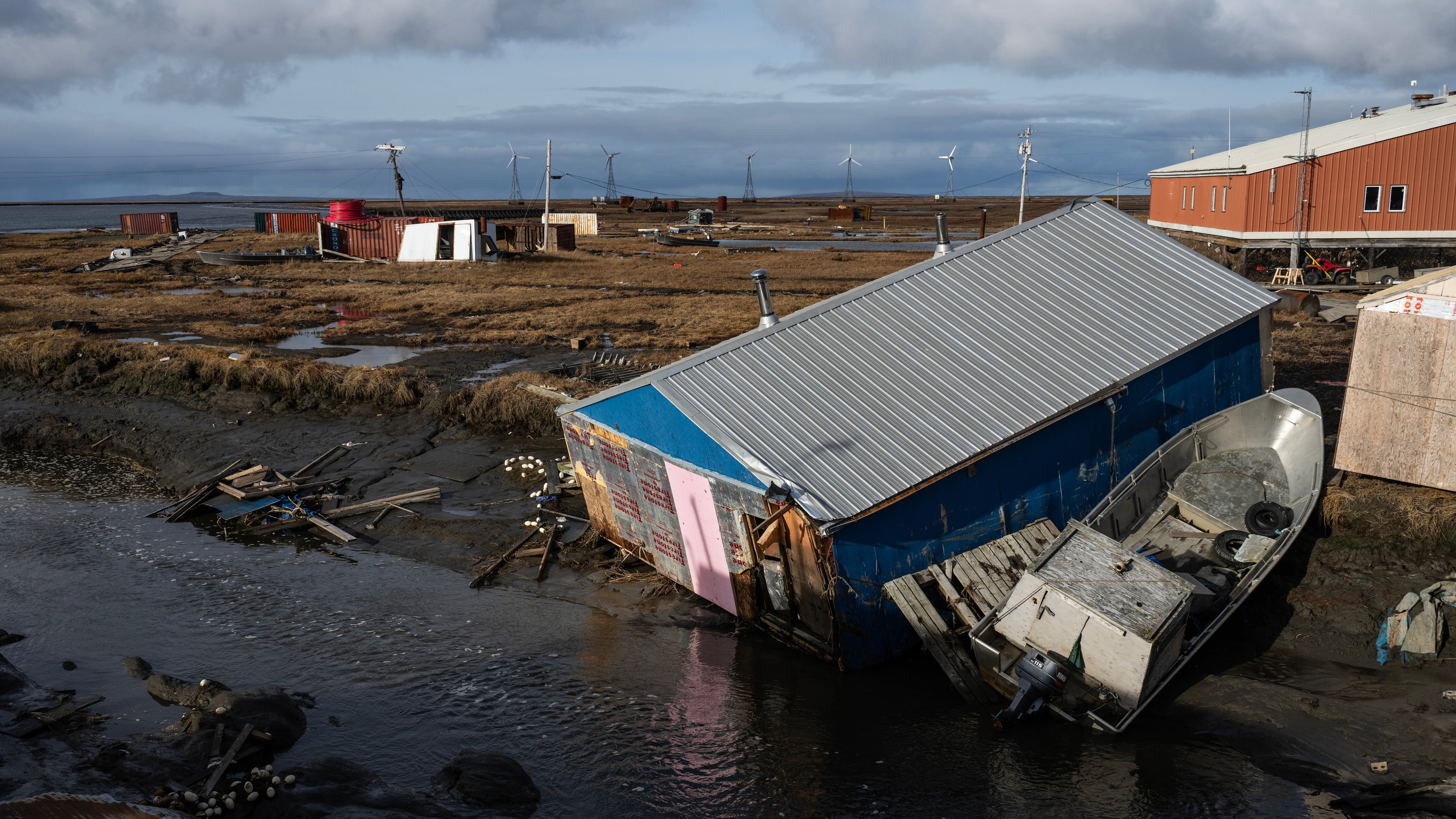A home is left damaged in Kipnuk, Alaska, on a stream bank after the remnants of Typhoon Halong caused widespread destruction in the coastal village in Western Alaska, Friday, Oct. 17, 2025. (Marc Lester/Anchorage Daily News via AP)