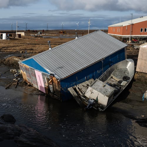 A home is left damaged in Kipnuk, Alaska, on a stream bank after the remnants of Typhoon Halong caused widespread destruction in the coastal village in Western Alaska, Friday, Oct. 17, 2025. (Marc Lester/Anchorage Daily News via AP)