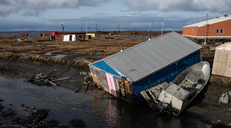 A home is left damaged in Kipnuk, Alaska, on a stream bank after the remnants of Typhoon Halong caused widespread destruction in the coastal village in Western Alaska, Friday, Oct. 17, 2025. (Marc Lester/Anchorage Daily News via AP)