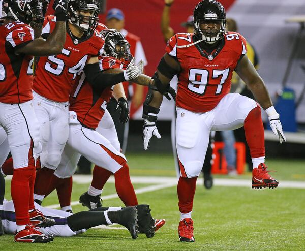 Falcons defensive tackle Grady Jarrett stomps his feet after making a big stop.  Curtis Compton / ccompton@ajc.com