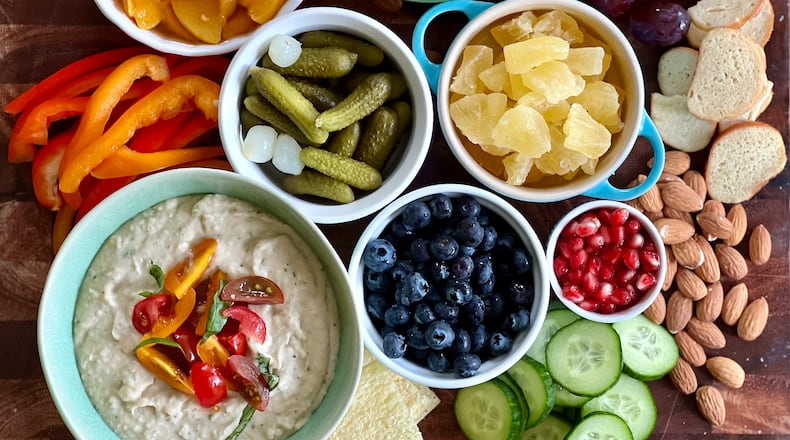 Brighten up your summertime snacking with a nutritionally balanced grazing board.
Kellie Hynes for The Atlanta Journal-Constitution
