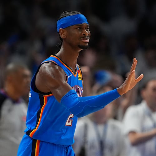 Oklahoma City Thunder guard Shai Gilgeous-Alexander celebrates after making a 3-pointer during the second half of Game 2 in the Western Conference finals NBA basketball playoffs series against the San Antonio Spurs Wednesday, May 20, 2026, in Oklahoma City. (AP Photo/Tony Gutierrez)