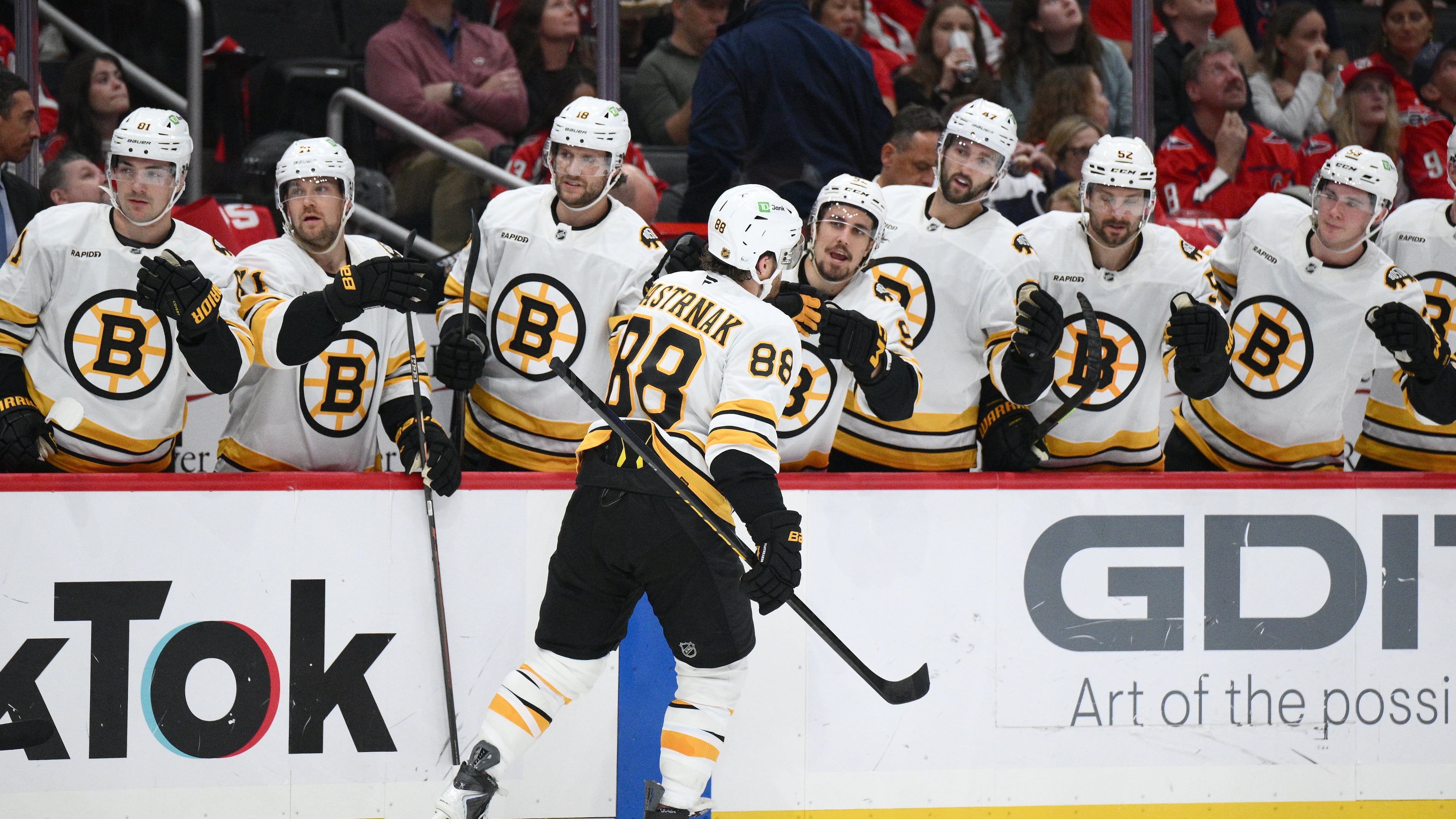 Boston Bruins right wing David Pastrnak (88) celebrates his goal during the second period of an NHL hockey game against the Washington Capitals, Wednesday, Oct. 8, 2025, in Washington. (AP Photo/Nick Wass)