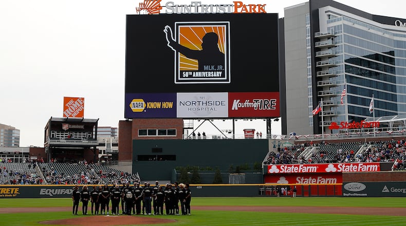 The Ebenezer Baptist Church choir stands during a moment of silence in the ceremony commemorating the 50th anniversary of Dr. Martin Luther King, Jr.'s assassination prior to the game between the Atlanta Braves and the Washington Nationals at SunTrust Park on April 4, 2018 in Atlanta, Georgia. (Photo by Kevin C. Cox/Getty Images)