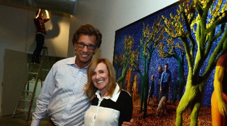 Dr Jim Chappuis, owner-founder of Westside Cultural Arts Center, stands with Fay Gold, owner of the Fay Gold Galley, at the gallery around the time it opened in June 2013. KENT D. JOHNSON / KDJOHNSON@AJC.COM