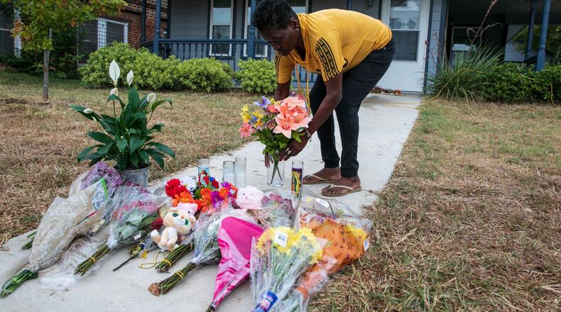 Flowers are placed in front of the home of Atatiana Jefferson in Fort Worth, Texas, Oct. 14, 2019. The former Fort Worth police officer who fatally shot Jefferson through her bedroom window was charged with murder on Monday. (Ilana Panich-Linsman/The New York Times)