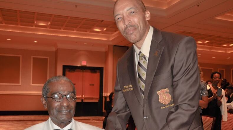 Iota Phi Theta Fraternity International Grand Polaris Robert M. Clark Jr., with fraternity founder John Slade.