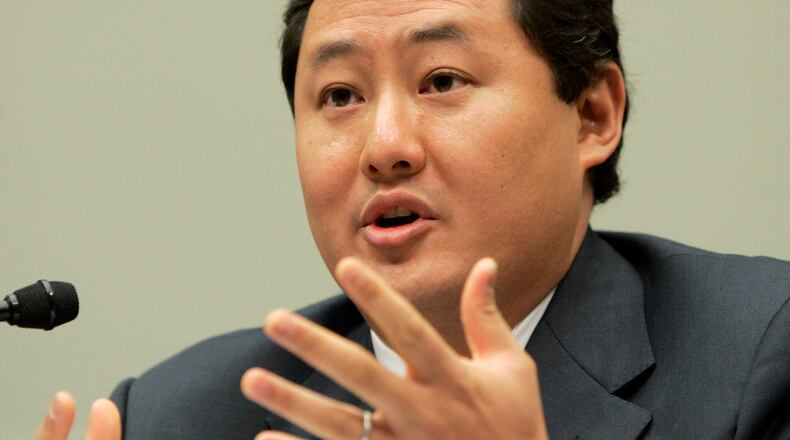 FILE - John Yoo, a law professor at the University of California at Berkeley, testifies on Capitol Hill in Washington, June 26, 2008. (AP Photo/Susan Walsh, File)