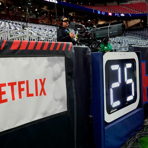 FILE - A Netflix banner is seen before an NFL football game between the Houston Texans and the Baltimore Ravens, Dec. 25, 2024, in Houston. (AP Photo/David J. Phillip, File)