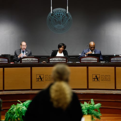 Parent Tammy Brazzelle, a member of the Safe Space to Learn Coalition, speaks at an Atlanta Public Schools board meeting in Atlanta on Aug. 10, 2026. The coalition is advocating to pass a policy preventing ICE agent entry in schools. (Arvin Temkar/AJC)