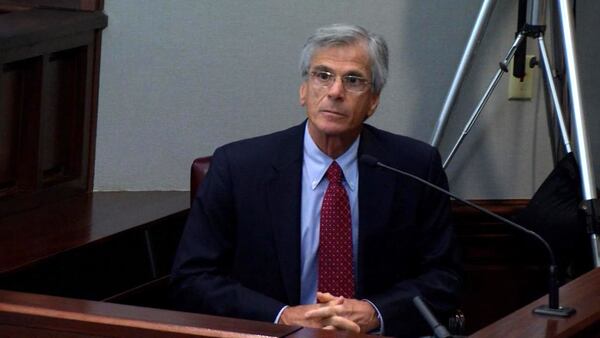 Brian Frist, who in 2014 was the Cobb County Chief Medical Examiner, testifies during the murder trial of Justin Ross Harris at the Glynn County Courthouse in Brunswick, Ga., on Tuesday, Oct. 18, 2016. (screen capture via WSB-TV)