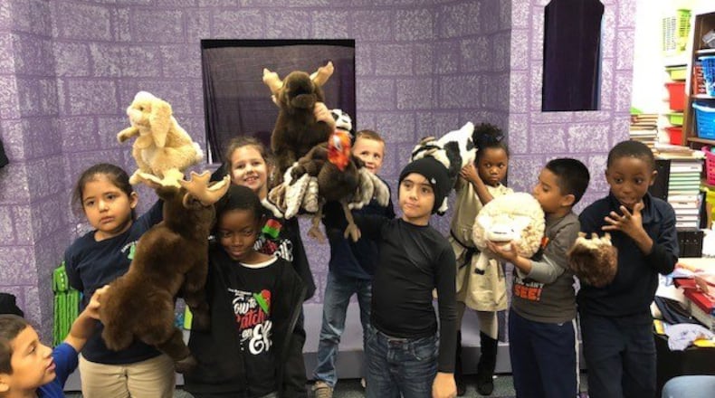 The Marietta City Schools Board of Education has agreed to transform the third media center in an elementary school into a Learning Commons at Marietta Center for Advanced Academics. These students are from Sawyer Road Elementary School, the site of one of the first two Learning Commons. Courtesy of Marietta City Schools