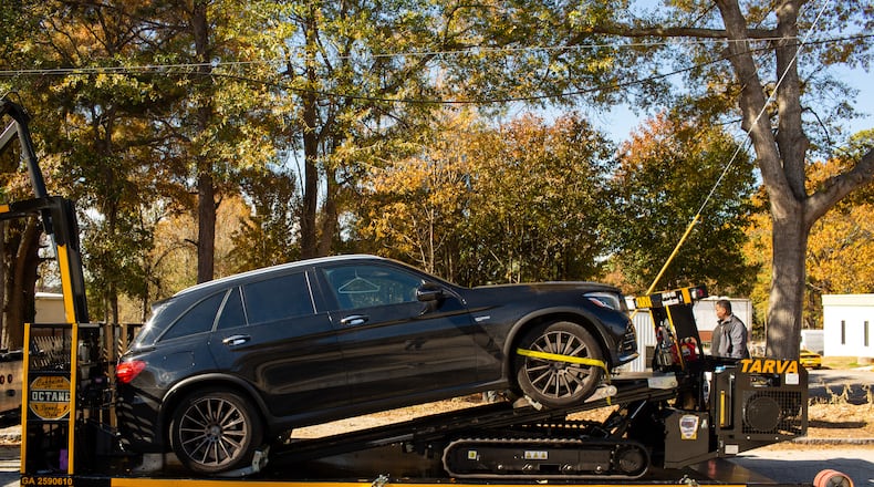 TARVA, a towing robot from France, tows a car onto a custom-designed towing truck at Tow Atlantaâs Scottsdale, Georgia, location on Thursday, Nov. 21, 2019. Tow Atlanta has been investing in technology such as the TARVA, the Tow Atlanta Recovery Vehicle Autobot, to assist with safely towing both luxury and ordinary cars in Atlanta.
(Photo/Rebecca Wright for the Atlanta Journal-Constitution)