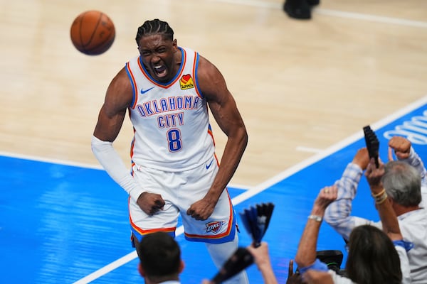 Oklahoma City Thunder forward Jalen Williams (8) celebrates after a dunk during the second half of Game 1 of the NBA Finals basketball series against the Indiana Pacers Thursday, June 5, 2025, in Oklahoma City. (AP Photo/Nate Billings)