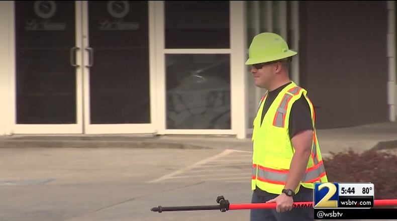 A look at a Marietta police officer disguised as a construction officer to catch distracted drivers.