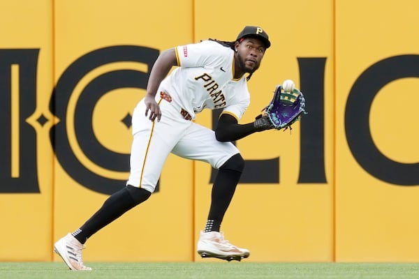 Pittsburgh Pirates center fielder Oneil Cruz catches a line drive hit by Milwaukee Brewers' Jackson Chourio during the fifth inning of a baseball game Sunday, May 25, 2025, in Pittsburgh. (AP Photo/Matt Freed)