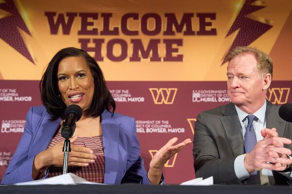 District of Columbia Mayor Muriel Bowser gestures toward NFL Commissioner Roger Goodell as they announce a new home for the NFL football team on the site of the old RFK Stadium, Monday, April 28, 2025, at the National Press Club in Washington. (AP Photo/Jacquelyn Martin)