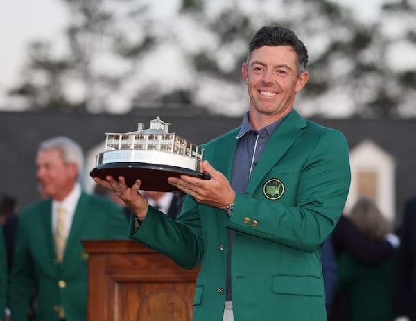 Rory McIlroy celebrates winning the Masters golf tournament at Augusta National Golf Club, Sunday, April 13, 2025, in Augusta, Ga. (Jason Getz/AJC)