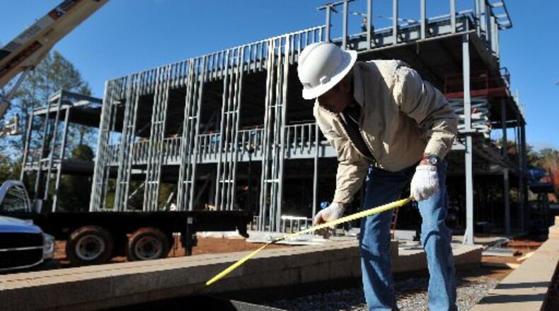 Contractors could seek special permission up to five times to work outside the hours allowed under the Sandy Springs noise ordinance, but it would be increasingly costly to do so. AJC FILE