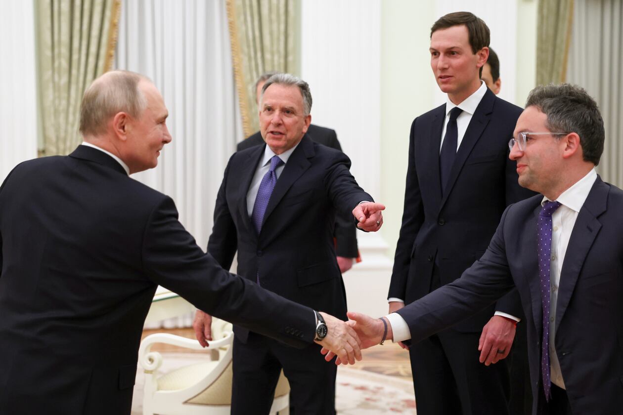 Russian President Vladimir Putin, left, greet U.S. President Donald Trump's envoys Steve Witkoff, centre left, Jared Kushner, second right, and Josh Gruenbaum, the head of the Federal Acquisition Service at the General Services Administration, at the Senate Palace of the Kremlin, in Moscow, Thursday, Jan. 22, 2026. (Alexander Kazakov/Sputnik, Kremlin Pool Photo via AP)