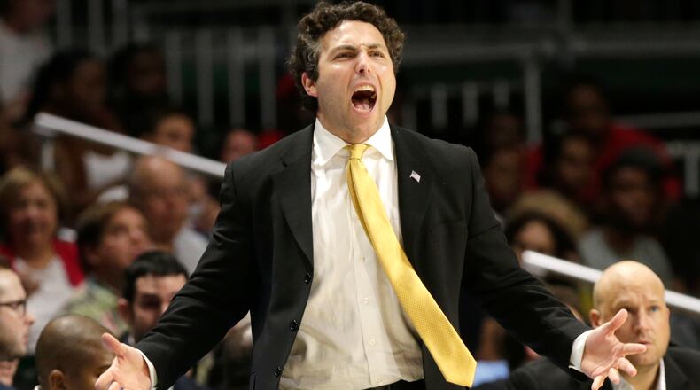 Georgia Tech coach Josh Pastner gestures during the second half of the team's NCAA college basketball game against Miami, Wednesday, Feb. 15, 2017, in Coral Gables, Fla. Miami defeated Georgia Tech 70-61. (AP Photo/Lynne Sladky)
