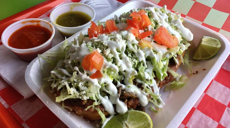 A huarache at Tortas Factory del D.F. is a massive, filling dish of masa, beans and steak for only $2.50. CONTRIBUTED BY WYATT WILLIAMS