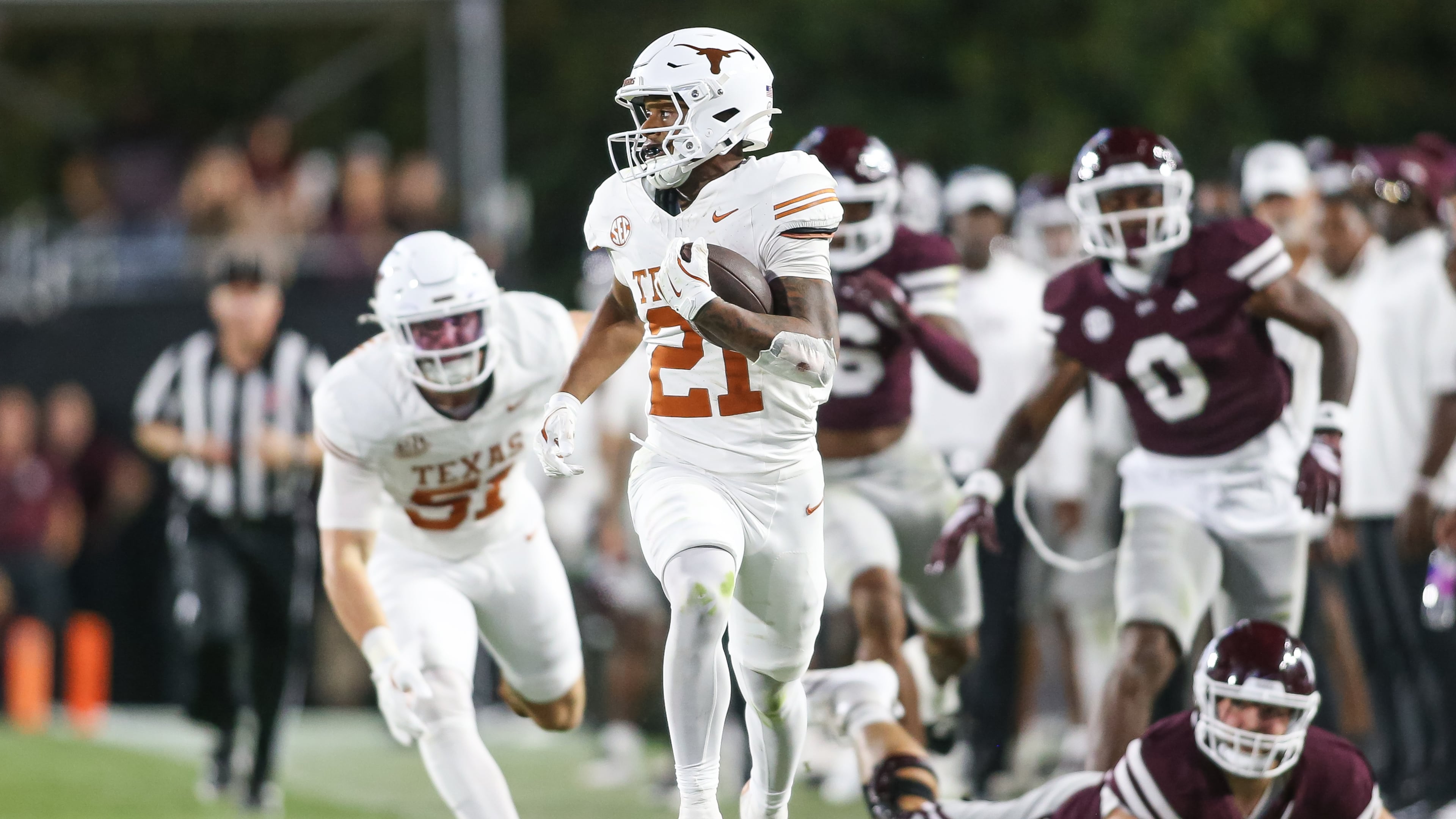 Texas wide receiver Ryan Niblett (21) runs a punt return for a touchdown against Mississippi State during the second half of an NCAA college football game in Starkville, Miss., Saturday, Oct. 25, 2025. (AP Photo/James Pugh)