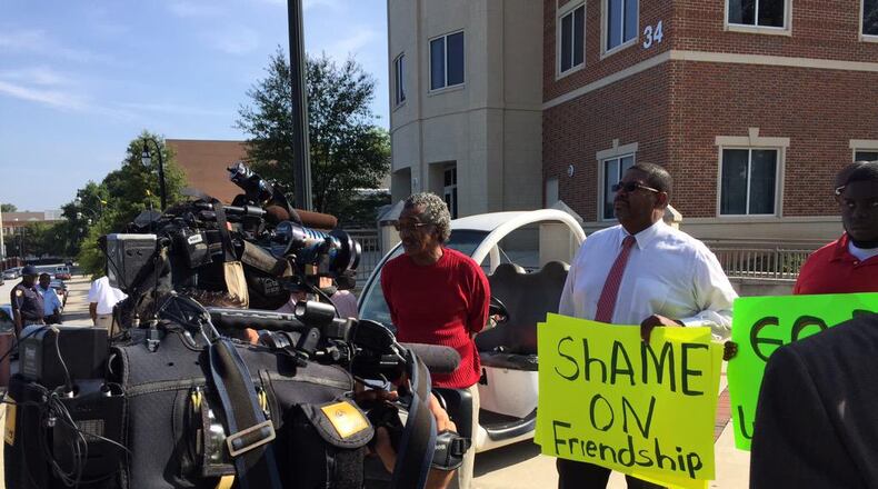 A group of senior citizens visited Friendship Baptist Church on Sunday to protest the air conditioning issues at Friendship Towers, a 100-unit residence owned by the church. (Credit: Channel 2 Action News)