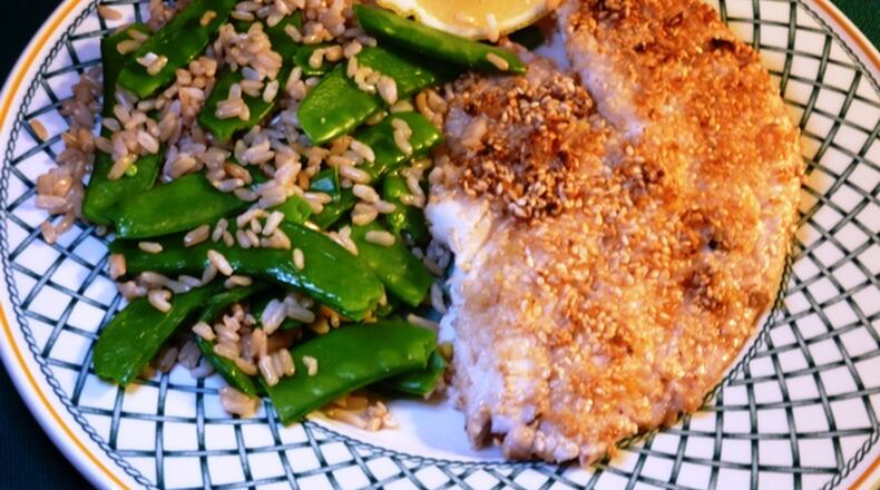 Sesame seeds, fresh ginger and a little butter are the only requirements for this standout snapper dish. (Linda Gassenheimer/TNS)