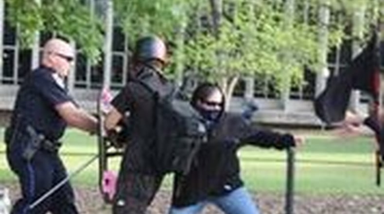Anti-fascist activists clashed with police before a controversial speech by alt-right ideologue Richard Spencer on the campus of Auburn University Tuesday. CHRIS JOYNER / CJOYNER@AJC.COM
