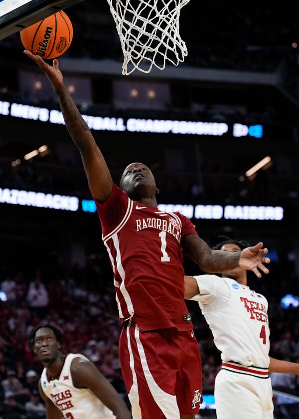 Arkansas guard Johnell Davis (1) shoots during the first half in the Sweet 16 of the NCAA college basketball tournament game against Texas Tech, Thursday, March 27, 2025, in San Francisco. (AP Photo/Godofredo A. Vásquez)