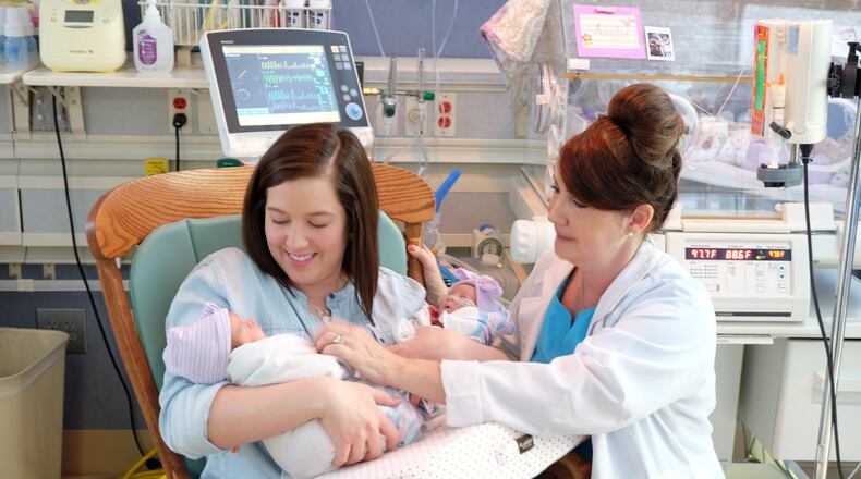 Kayde Reynolds, left, is visited by Debbie Patrick RN, a certified lactation consultant at WellStar Cobb Hospital. Courtesy photo.