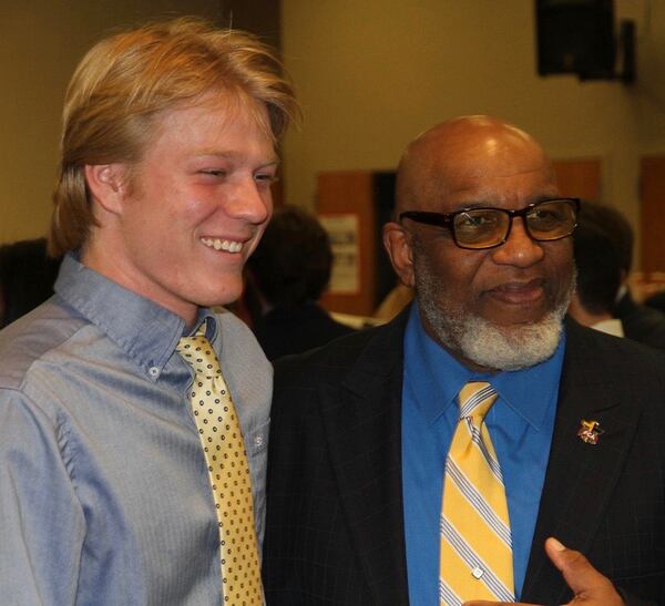 Ron Hill with Jake Bloodworth, 19, UGA freshman who played football at The Mount Vernon School in Sandy Springs. Hill was both a confidant and defensive line coach for Bloodworth. 