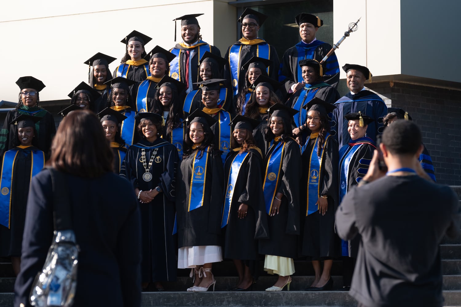Masters of Public Health students pose for a photo before graduation at Morehouse School of Medicine on Saturday, May 16, 2026, in Atlanta. (Ben Gray for the AJC)