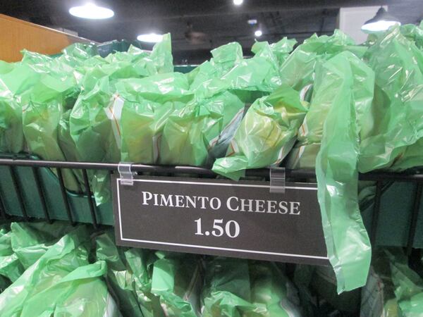 Pimiento cheese sandwiches fill a concession stand during the Masters at Augusta National Golf Club. (Ken Sugiura/AJC 2025)