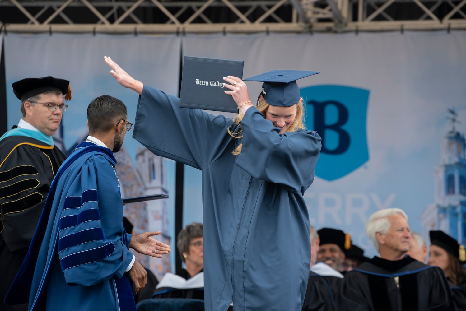 Haley Rouk celebrates as she is given her bachelor of science diploma at Berry College on Saturday, May 9, 2026. The nationally recognized Georgia college is located on a  campus encompassing more than 27,000 acres in Rome, Ga. (Jonathan Garcia/Berry College)