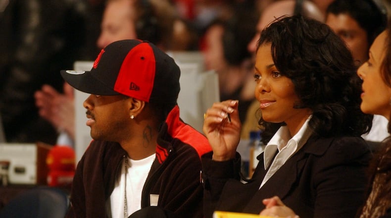 Jermaine Dupri and Janet Jackson at the NBA All Star Game at Philips Arena in 2003. (T. LEVETTE BAGWELL/AJC staff)