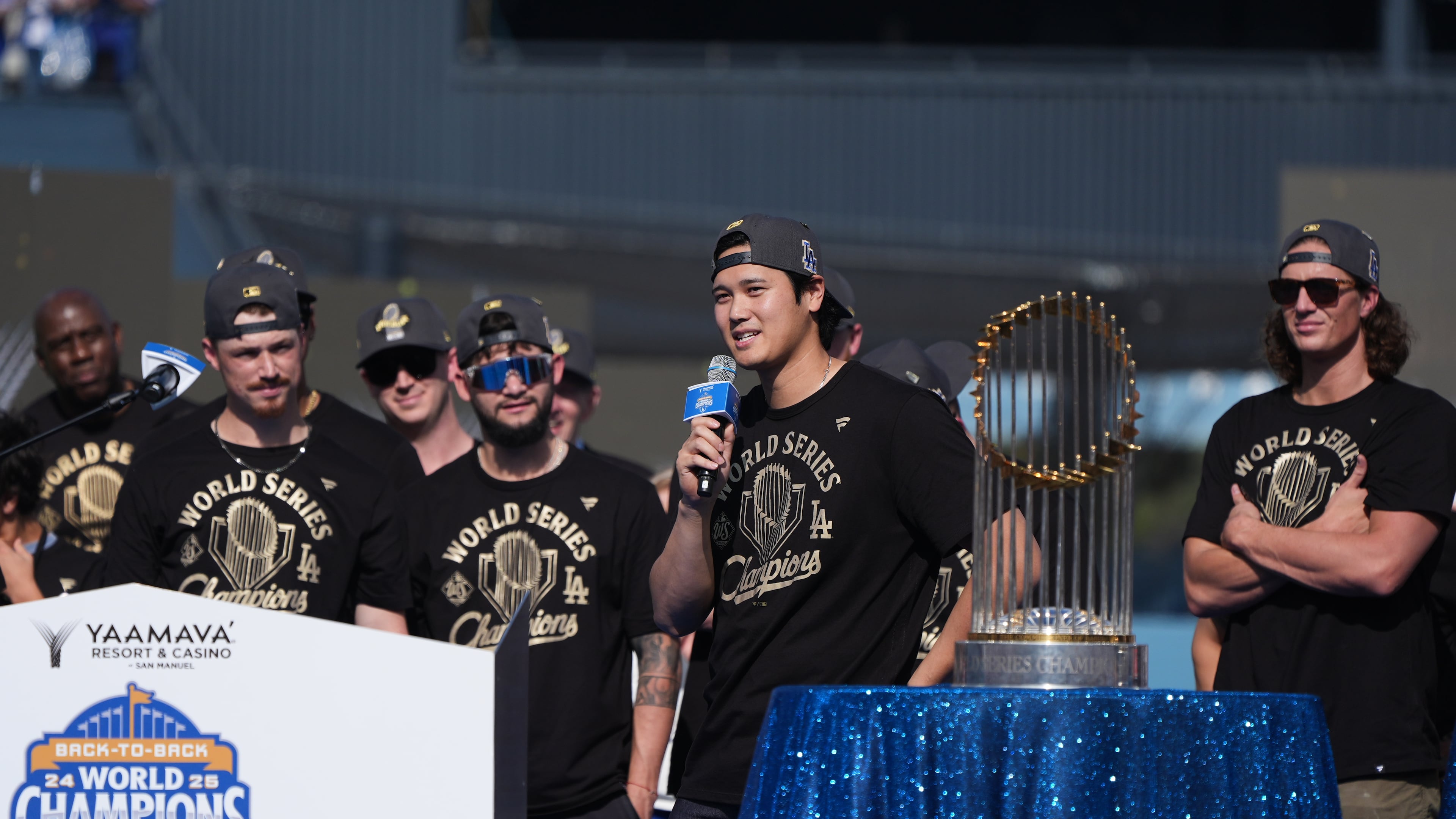 Los Angeles Dodgers' Shohei Ohtani speaks during a celebration of the baseball team's World Series win at Dodger Stadium on Monday, Nov. 3, 2025, in Los Angeles. (AP Photo/Gregory Bull)