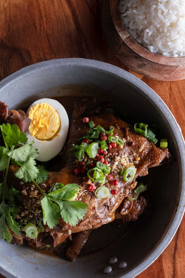 Chicken adobo with a side of white riceis on the menu at Kamayan ATL (ROSANA LUCIA FOR THE ATLANTA
JOURNAL-CONSTITUTION)