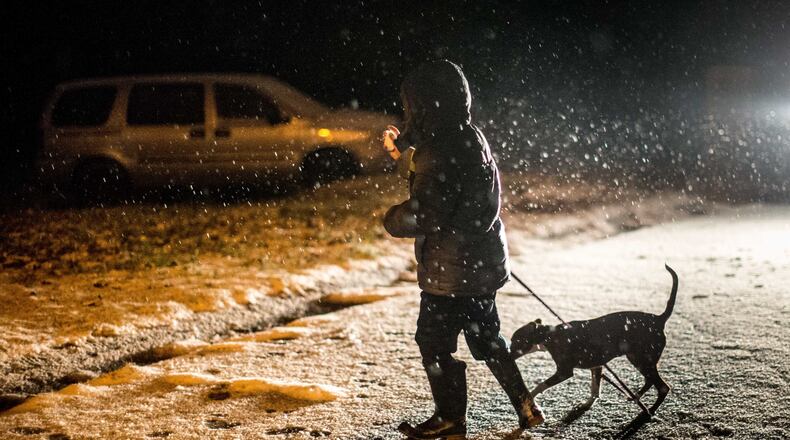 Snow falling in Cobb County. (BRANDEN CAMP/SPECIAL)