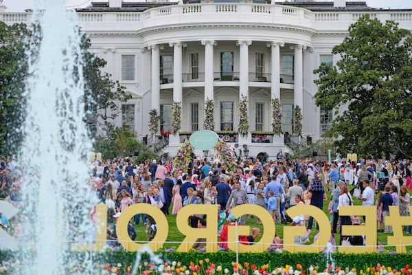 Guests arrive on the South Lawn of the White House before President Donald Trump and first lady Melania Trump participate in the White House Easter Egg Roll Monday, April 21, 2025, in Washington. (AP Photo/Alex Brandon)